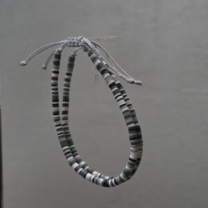 Gray and white needed rope braclet adjustable